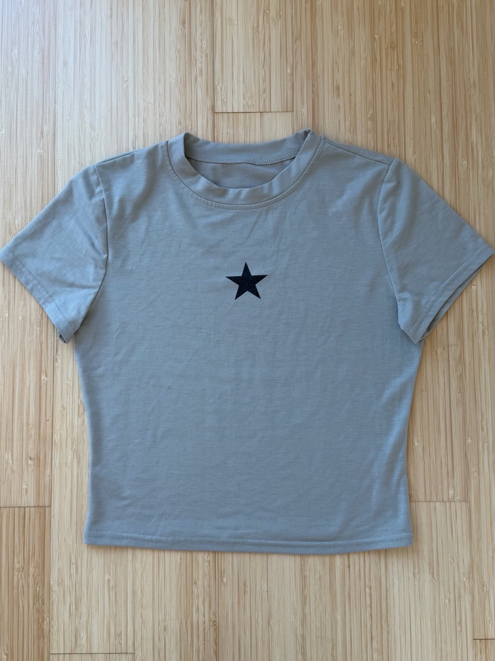 Urban Outfitters Light Grey Baby Tee with Star Graphic